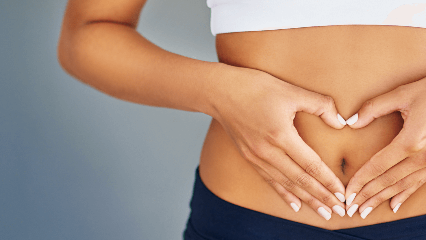 woman holding her belly